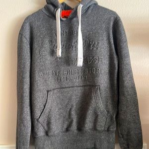 NWOT Vintage Superdry orange label hoodie. With Superdry logo embossed
